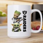 Baby Yoda And Groot Hug Oakland Raiders 2 mug.jpg