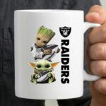 Baby Yoda And Groot Hug Oakland Raiders 3 mug.jpg