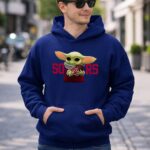 Baby Yoda Holding Football with Oklahoma Sooners 2 Hoodie.jpg