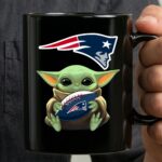 Baby Yoda Hug Ball New England Patriots Mug 3.jpg