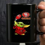Baby Yoda Throwing San Francisco 49ers Football with SF Logo and Stars 3 mug.jpg