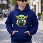 Mashup Baby Yoda Holding Buffalo Bills and Buffalo Sabres 2 Hoodie.jpg