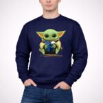 Mashup Baby Yoda Holding Buffalo Bills and Buffalo Sabres 3 Sweatshirt.jpg
