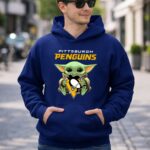 Pittsburgh Penguins Baby Yoda Holding Hockey 2 Hoodie 1.jpg