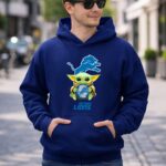 Star Wars Baby Yoda Holding Detroit Lions Symbol with Team 2 Hoodie.jpg