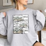 Star Wars Mandalorian Baby Yoda The Child Protect Attack Snack Comic Strip 3 Sweatshirt.jpg